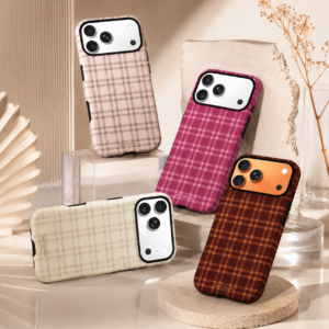 Korean plaid iPhone cases in pink, cream white, Barbie pink and red brown colors displayed in aesthetic studio scene