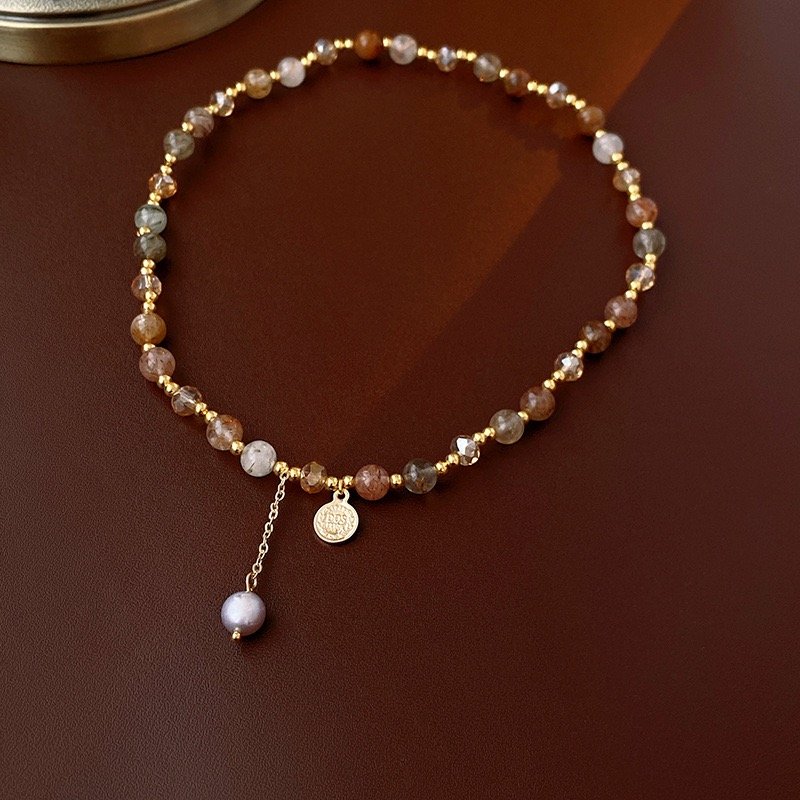 Gold-tone natural stone beaded wrap bracelet with dangling pearl-style charm