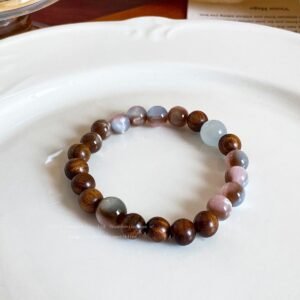 Vintage cat eye bracelet close-up with glossy round beads