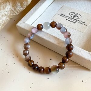 Soft vintage stretch bracelet with earthy brown and pastel cat eye beads