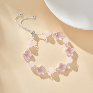 lucky clover crystal bracelet in blush pink with adjustable silver pull chain