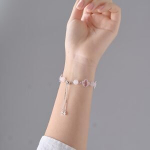 blush pink crystal four leaf clover bracelet aesthetic jewelry detail shot