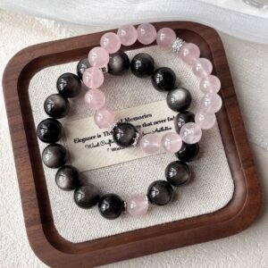 Crystal beaded bracelet in Obsidian Black and Rose Quartz Pink