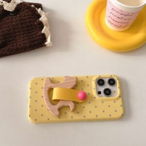 Yellow Polka Dot Rocking Horse iPhone Case with wooden rocking horse holder