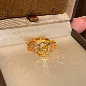 Gold vintage inspired crystal cocktail ring displayed in jewelry box