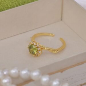 Gold adjustable flower ring with rhinestone details